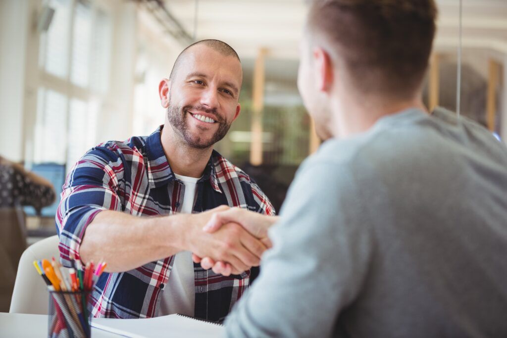 QuickStart Customer Service shaking hands